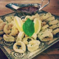 Fried Calamari · Served with hot or sweet sauce.