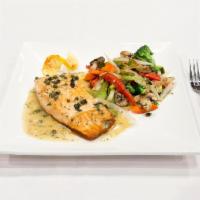 Salmon Piccata · Atlantic seared salmon with a lemon butter sauce and capers served with spaghetti.