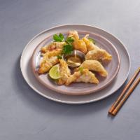 Pot Stickers · 8 pieces of our chicken and vegetables crispy dumplings. Comes with a side of sweet and sour...