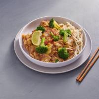 Pad Sie-Ew · Wide and flat rice noodles stir-fried with broccoli, in our Sie-Ew sauce, topped with beansp...