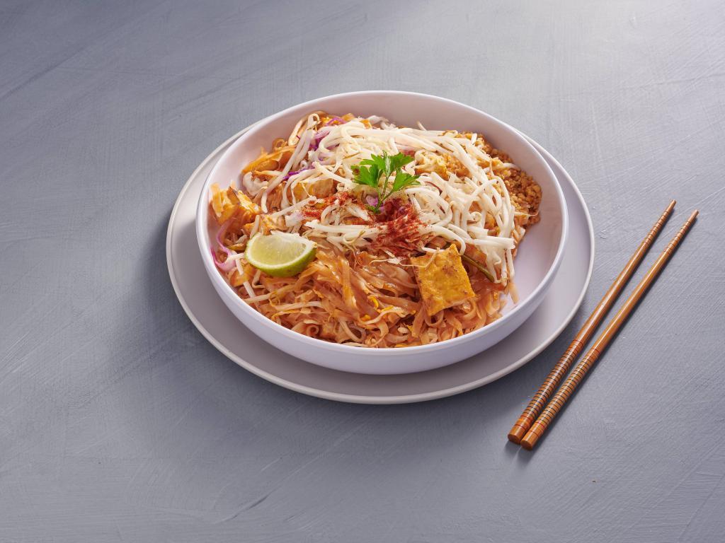 58. Pad Thai · Thin and flat rice noodles stir-fried with bean sprouts and green onion in our special Pad Thai sauce, topped with bean sprout, cabbage, and crushed peanuts.