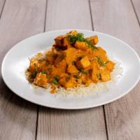 Paneer Tikka Masala · Homemade cheese cubes in a mildly spiced creamy tomato sauce. Served with fresh naan and pea...