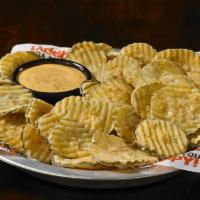 Fried Pickles · Handmade to order and served with our signature tangy dipping sauce. 