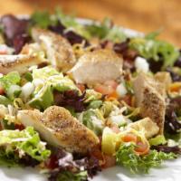 Chicken Garden Salad · Spring mix green piled with diced tomatoes, crisp cucumbers, cheddar cheese and croutons and...