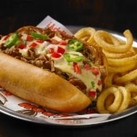 Philly Cheesesteak Sandwich · Steak or chicken topped with sauteed onions, green peppers, mushrooms and provolone cheese a...