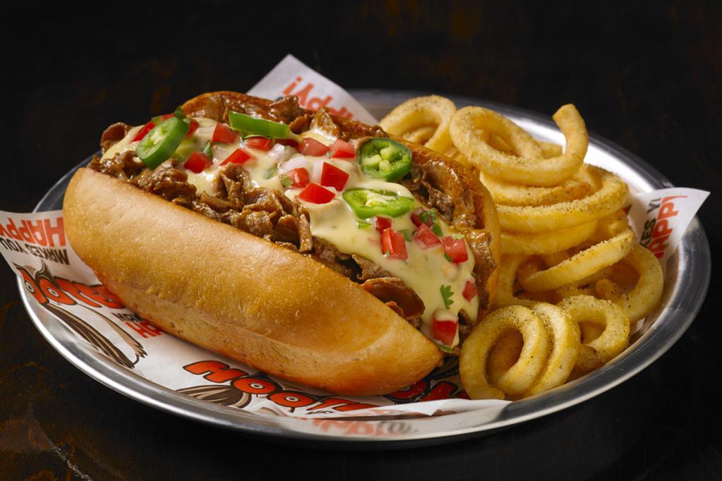 Philly Cheesesteak Sandwich · Steak or chicken topped with sauteed onions, green peppers, mushrooms and provolone cheese and served on a hoagie roll.