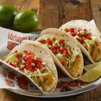 Mahi Tacos · Grilled Mahi to perfection you'll feel like you're on the beach in Mexico. Served on warm to...
