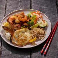27. Com Dac Biet · Special rice plate, pork cake, tiger shrimp and pork chop.