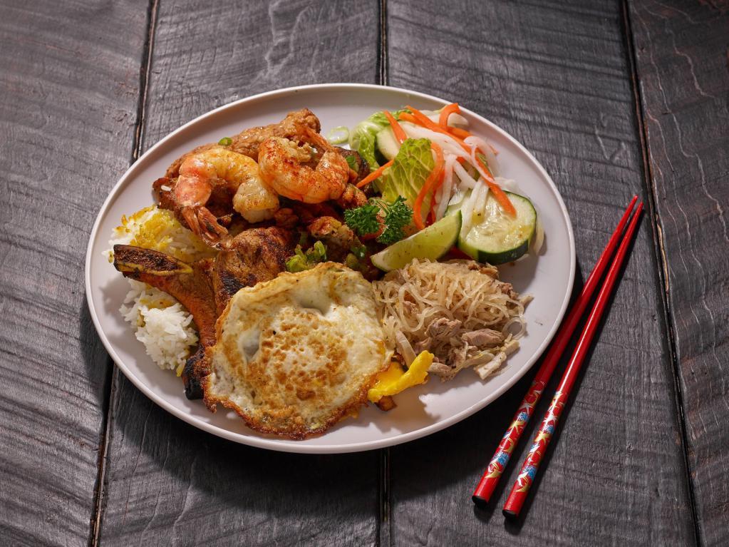 27. Com Dac Biet · Special rice plate, pork cake, tiger shrimp and pork chop.