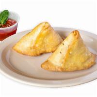 Veggie Samosa (2 Pieces) · Puffed pastries stuffed with diced potatoes, green peas and our special spices. Served with ...