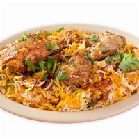Chicken Biryani · Basmati rice mixed with our special spices and chicken.