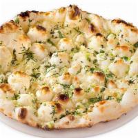 Garlic Naan · Soft leavened bread topped with garlic.
