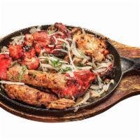 Chicken Mixed Grille · Mixed Grilled Chicken Platter that includes: Chicken Tikka Leg,  Chicken Seekh, Chicken Biha...