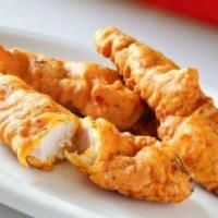 Chicken Pakora · Seasoned chicken deep fried in spicy chickpeas batter and golden fried.
