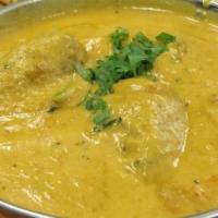 Malai Kofta · Minced vegetable balls cooked in creamy tomato sauce. Served with rice or naan. Vegetarian.
