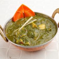 Saag Chicken · Boneless chicken pieces cooked in special spices and spinach sauce.
