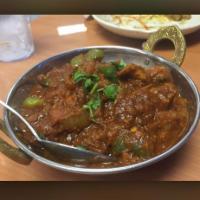 Lamb Curry · Boneless lamb pieces cooked in special spices.