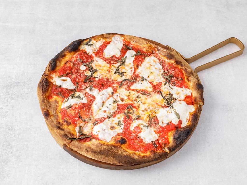 Margarita Pizza · Crushed roasted tomatoes with fresh mozzarella, basil, and extra virgin olive oil.