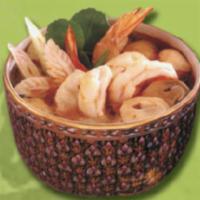 Tom Yum Kung Soup · Thai style spicy shrimp soup with tomato, mushroom and onion.