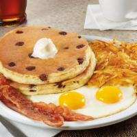 Chocolate Chip Pancake Breakfast · Ghirardelli® chocolate chips cooked inside buttermilk pancakes topped with whipped cream. Se...