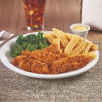 Premium Chicken Tenders Dinner · Premium golden-fried chicken tenders with choice of dipping sauce. Served with two sides and...