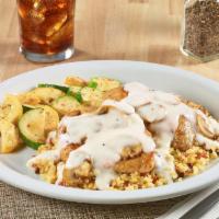 New! Creamy Parmesan Chicken · Two grilled seasoned chicken breasts over a bed of whole grain rice topped with Parmesan sau...