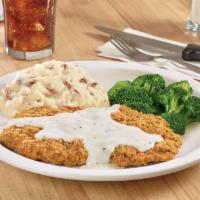 Country-Fried Steak · Chopped beef steak smothered in country gravy.