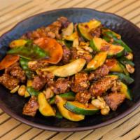5. Kung Pao Chicken · Szechuan style lightly breaded chicken cubed with zucchini, carrot, snow peas and toasted pe...
