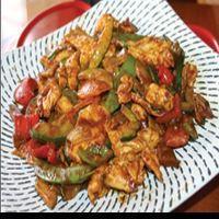 8. Asian Curry Chicken · Thai style yellow curry chicken with coconut sauce, onion, red pepper, green pepper and long...