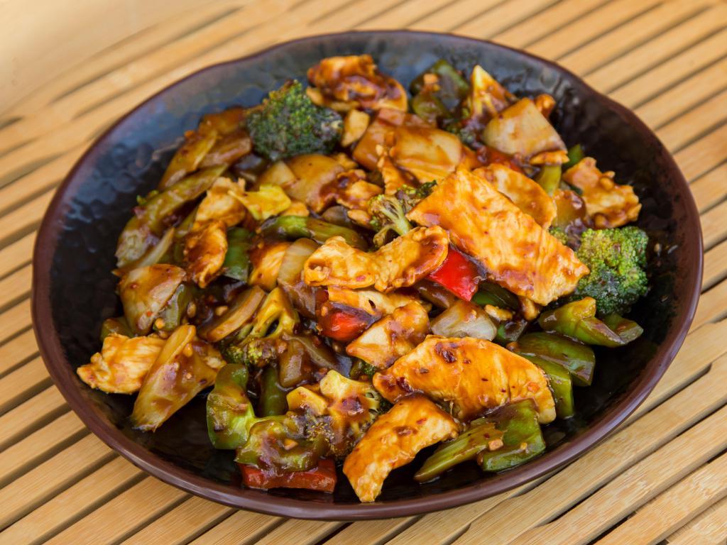 11. Hunan Chicken · Hunan style chicken with broccoli, celery, green and red peppers and onion in a spicy hunan sauce. Spicy.