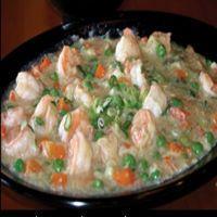 23. Shrimp with Lobster Sauce · Chinese traditional style jumbo shrimp with lobster sauce, green peas, carrot and garnished ...