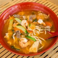Korean Noodle Soup · Jung pong spicy noodle soup with chicken, shrimp, beef, zucchini, carrot and cabbage. Spicy.