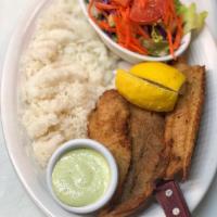 Filet de Pescado Frito · Pan fried white fish served with garlic steamed rice and our house salad.