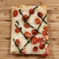 Rita Pizza · Fresh mozzarella, cherry tomatoes, roasted garlic, basil pesto & fresh basil.