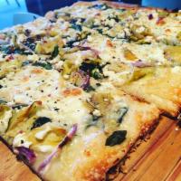 Venus Pizza · Artichoke hearts, baby spinach, red onion, fontina, fresh mozzarella, feta & roasted garlic.