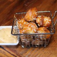 Pretzel Bites · Side of beer cheese sauce and mustard.