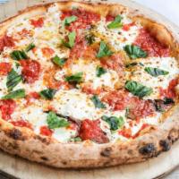WF Margherita Pizza · San Marzano, fresh mozzarella, olive oil, Parmigiana and basil.