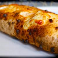 X4 Cheese Calzone · 4 cheese and sauce on side.