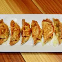 6 Momo's Dumpling · Vegetable dumpling.