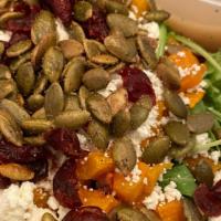 Autumn Salad · roasted butternut squash, goat cheese, dried cranberries, spiced pumpkin seeds over mixed gr...