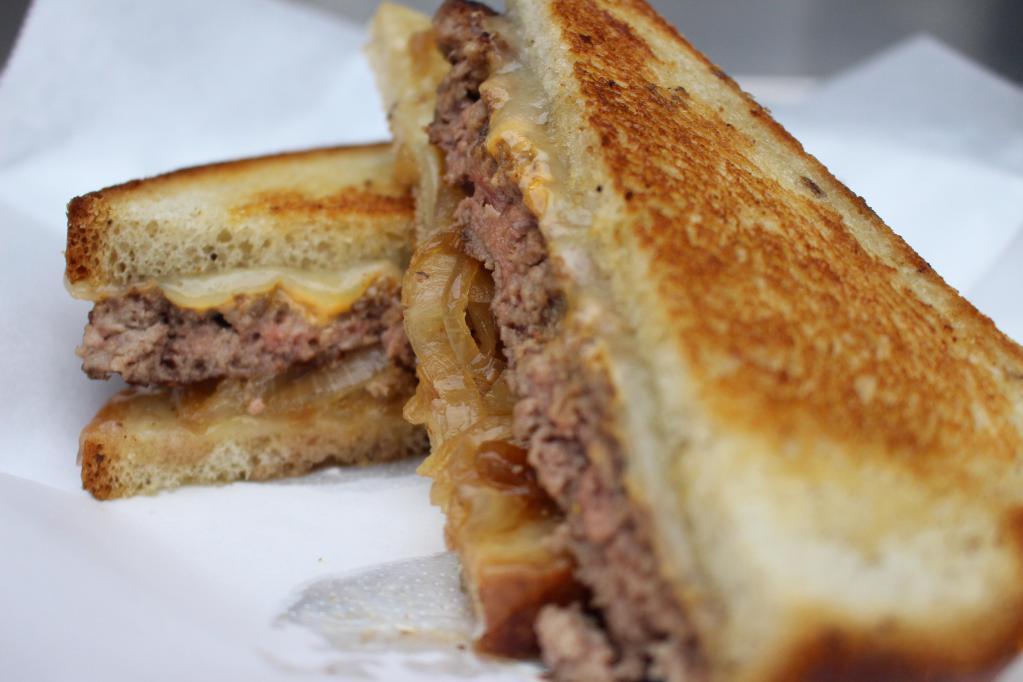 Patty Melt · smashed 1/2lb beef burger, Swiss Cheese, grilled onions & kick n' bayou sauce on grilled rye