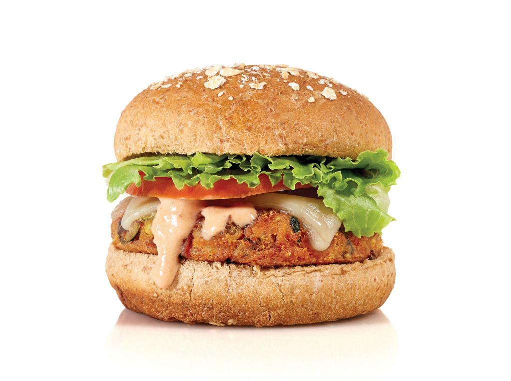 VEGEFI BURGER · Crispy Quinoa + Fresh-Cut Veggie Burger, White Cheddar, Lettuce, Tomato, BurgerFi Sauce on a Vegan Multigrain Bun. *VegeFi Patty Contains Cheese.