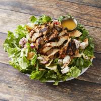 Fattoosh Tawook Salad · Large salad mixed with toasted pita and topped with chargrilled chicken breast.