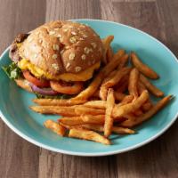 All American Burger · We topped this burger with our favorite American cheese, applewood-smoked bacon, served on o...