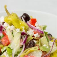 Greek Salad · Fresh romaine lettuce, tomatoes, cucumbers, onions, green peppers, Kalamata olives, pepperon...