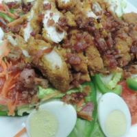 Crispy Chicken Salad · Chopped breaded chicken, romaine lettuce, green peppers, onions, carrots, tomatoes, bacon an...