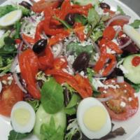 House Salad · Mixed Spring greens, tomatoes, cucumbers, red onions, roasted red peppers, feta cheese, kala...