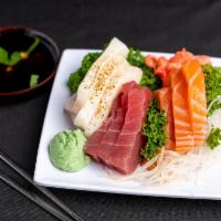 Sashimi Appetizer · 9 pieces of assorted fish salmon, tuna and chef choice white fish.