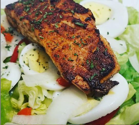 Salmon Salad · Blackened Salmon Steak Salad served with garlic bread and a choice of dressing