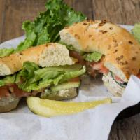 Chicken Salad Sandwich · Chicken salad made in-house, lettuce, tomato, and cucumbers on a choice of bagel.